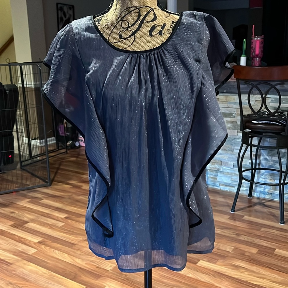 Size XL grey with silver shimmer ruffle top